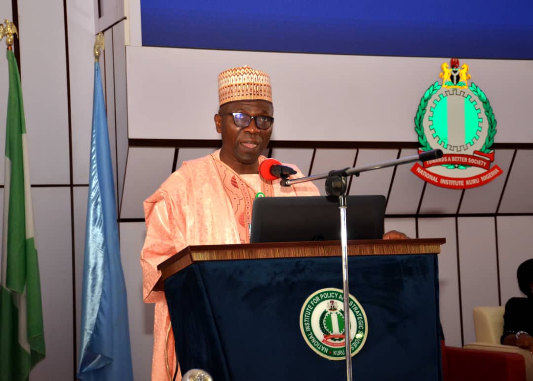 Air Vice Marshall Abdullah Kassimu, reading Prof. Ezeilo citation and introducing the NIPSS guest lecturer